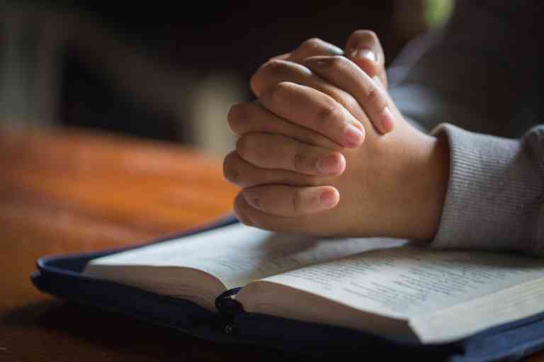 bigstock-Close-Up-Woman-Hand-Praying-W-264824791